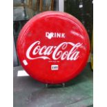 A RARE COCA COLA ENAMEL ADVERTISING PANEL. 36cms DIAMETER.