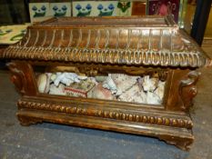 AN ANTIQUE ITALIAN CARVED BAROQUE STYLE GILTWOOD GLAZED CASKET CONTAINING A COLLECTION OF EXOTIC