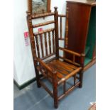 AN EARLY COUNTRY ASH SPINDLE WING BACK COTTAGE CHAIR.