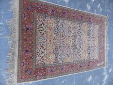 A PERSIAN RUG OF UNUSUAL TILE PATTERN DESIGN. 210x134cms.