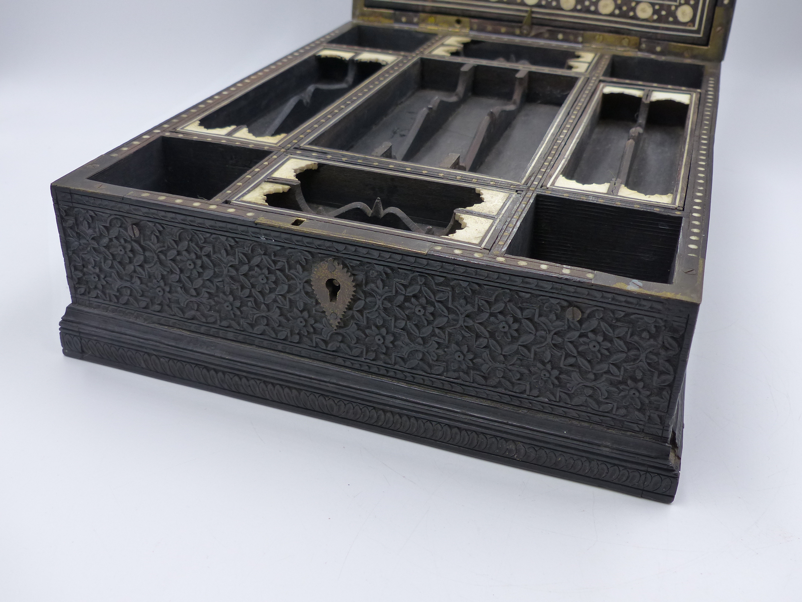 A CARVED INDO COLONIAL HARDWOOD LIFT TOP DRESSING CASE WITH OVERALL INTRICATE FOLIATE DECORATION, - Image 2 of 17