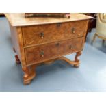 AN UNUSUAL 18th.C.AND LATER WALNUT CHEST OF TWO LONG DRAWERS ON SCROLL STAND WITH SHAPED X-