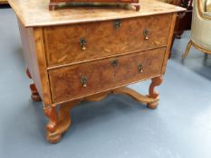 AN UNUSUAL 18th.C.AND LATER WALNUT CHEST OF TWO LONG DRAWERS ON SCROLL STAND WITH SHAPED X-