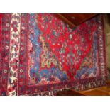 A PERSIAN HAMMADAN CARPET. 360 c 270cms.