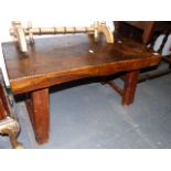 A RUSTIC SMALL PIG BENCH COFFEE TABLE. W.86cms