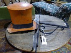 A GOOD HAND WROUGHT TOLE HATTERS OR MILLINERS SIGN IN THE FORM OF A FLARED TOP HAT MOUNTED ON