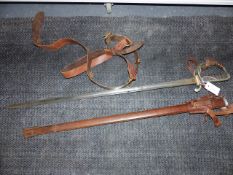A WWII PERIOD DRESS SWORD WITH ETCHED BLADE AND GR CYPHER IN ORIGINAL LEATHER WRAPPED SCABBARD AND