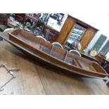 AN INTERESTING ANTIQUE ORIENTAL SMALL BOAT. L.194cms.