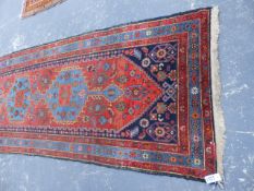 AN ANTIQUE PERSIAN HAMADAN RUNNER. 477x107cms.