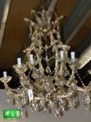 A FRENCH STYLE CAGE FORM TWELVE LIGHT CRYSTAL SCROLL ARM CHANDELIER. H.90cms.