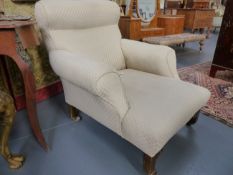 AN EARLY 20th.C.DEEP SEATED LIBRARY ARMCHAIR.