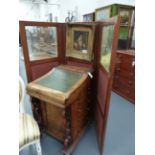 A MAHOGANY LATE VICTORIAN THREE FOLD DRESSING SCREEN WITH GLAZED TOP PANELS ABOVE FABRIC INSETS. H.