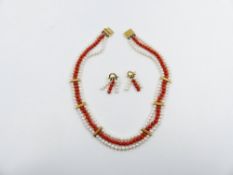 A PEARL AND CORAL TRIPLE ROW COLLAR WITH EGYPTIAN HALLMARKS TOGETHER WITH MATCHING DROP EARRINGS.