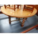A LARGE VICTORIAN OVAL MAHOGANY CENTRE TABLE ON CARVED BARLEY TWIST SUPPORTS. APPROX.105 x 137cms.