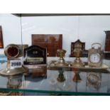 A HALLMARKED SILVER CASED DRESSING TABLE CLOCK WITH A FRENCH MOVEMENT, A SILVER AND TORTOISE SHELL