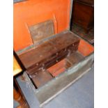 AN ANTIQUE PINE CARPENTER'S TOOL CHEST WITH FITTED INTERIOR.