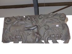 AN IMPRESSIVE 18th.C.CARVED OAK DECORATIVE ELEMENT WITH CHERUB AND NESTS OF BIRDS. APPROX W.100 x