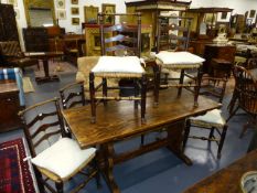 A SET OF SIX 19th.C.RUSH SEATED ASH LADDER BACK CHAIRS WITH TURNED CREST RAILS.
