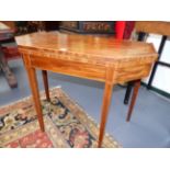 A LATE GEORGIAN INLAID MAHOGANY TEA TABLE WITH ANGLED CORNERS AND TAPERED LEGS. H.73 x W.91cms.