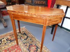 A LATE GEORGIAN INLAID MAHOGANY TEA TABLE WITH ANGLED CORNERS AND TAPERED LEGS. H.73 x W.91cms.
