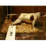 A ROYAL DOULTON FIGURE OF AN AMERICAN POINTER INSCRIBED AND NUMBERED ON BASE. W.30cms.