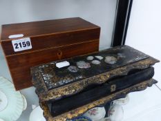 A GEORGIAN MAHOGANY TEA CADDY AND A PAPIER MACHE GLOVE BOX.