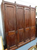 A LARGE VICTORIAN PUGINESQUE GOTHIC PINE LINEN PRESS. APPROX 230 x 253cms.