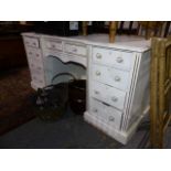 A 19th.C.PAINTED KNEEHOLE DRESSING TABLE WITH ARRANGEMENT OF NINE DRAWERS. W.149cms.