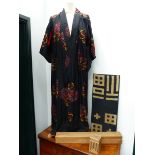 A JAPANESE SILK KIMONO TOGETHER WITH A MOUNTED FABRIC PANEL AND TWO BOXES, TRAYS,ETC.
