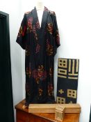 A JAPANESE SILK KIMONO TOGETHER WITH A MOUNTED FABRIC PANEL AND TWO BOXES, TRAYS,ETC.