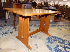 A SMALL HAND MADE ARTS AND CRAFTS SCOTTISH SCHOOL OAK AND WALNUT REFECTORY TABLE WITH PIERCED