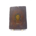 AN EARLY POLYCHROME PANEL OR ICON DECORATED WITH A PORTRAIT OF CHRIST, INSCRIBED AND UNFRAMED. 11