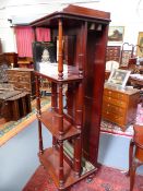 A VICTORIAN MAHOGANY FOUR TIER WHAT NOT/LEAF HOLDER CABINET ON RING TURNED SUPPORTS WITH BRASS
