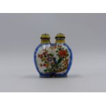 A CHINESE CANTON ENAMEL TWIN FORM SNUFF BOTTLE DECORATED IN THE FAMILLE ROSE PALETTE WITH