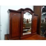 A MINIATURE VICTORIAN MAHOGANY TRIPLE WARDROBE WITH CENTRAL MIRRORED DOOR ENCLOSES DRAWERS FLANKED