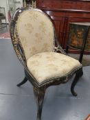 A VICTORIAN PAPIER MACHE SALON CHAIR WITH GILT AND INLAID MOTHER OF PEARL DECORATION, UPHOLSTERED