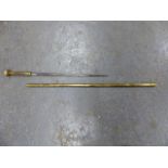 AN INTERESTING ORIENTAL BRASS AND COPPER INLAID SWORD STICK WITH FOUR CHARACTER SIGNATURE TO THE