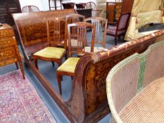 AN ANTIQUE DUTCH MARQUETRY INLAID SCROLL END BED DECORATED INSIDE AND OUT WITH PANELS OF FOLIAGE AND