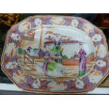 A CHINESE EXPORT FAMILLE ROSE OCTAGONAL MEAT PLATE, CENTRAL SCENE OF FIGURES ON A TERRACE. W.36.