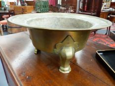 AN ORIENTAL BRASS TRIFID FOOTED CENSER/BOWL WITH FLARED RIM. D.41cms.