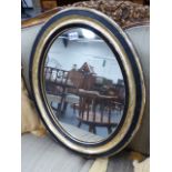 A 19th.C.IRISH OVAL WALL MIRROR.