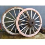 TWO LARGE ANTIQUE WAGON WHEELS. D.140cms.