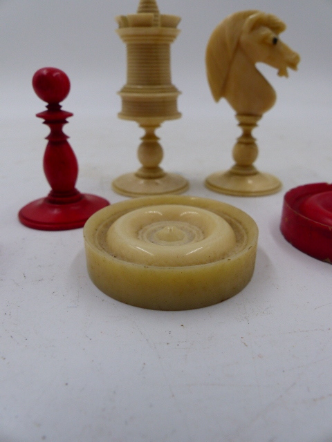 THREE ANTIQUE CARVED AND STAINED IVORY AND BONE BOARD GAME PIECES, TWO CHESS SETS AND A SET OF - Image 31 of 86