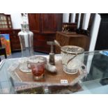 AN EDWARDIAN PIERCED RIM TRAY, A SILVER MOUNTED DECANTER, ETC.