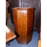 AN ANTIQUE OCTAGONAL PAINT DECORATED DISPLAY PEDESTAL. H.79cms.