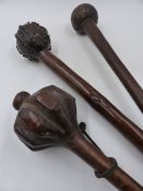 AN UNUSUAL ANTIQUE AFRICAN KNOBKERRIE OF BALL ENDED FORM AND NAIL STUD DECORATION. TOGETHER WITH