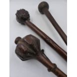 AN UNUSUAL ANTIQUE AFRICAN KNOBKERRIE OF BALL ENDED FORM AND NAIL STUD DECORATION. TOGETHER WITH