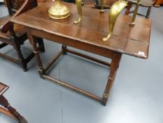 A 17th.C.OAK SIDE TABLE ON TURNED SUPPORTS AND STRETCHER BASE. 107 x 59cms.