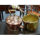 A LARGE VICTORIAN COPPER RANGE KETTLE AND A BRASS PAN.
