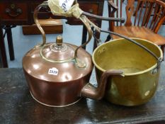 A LARGE VICTORIAN COPPER RANGE KETTLE AND A BRASS PAN.